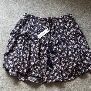 Oliviaceous Navy Floral Tiered Mini Skirt with tassel ties.